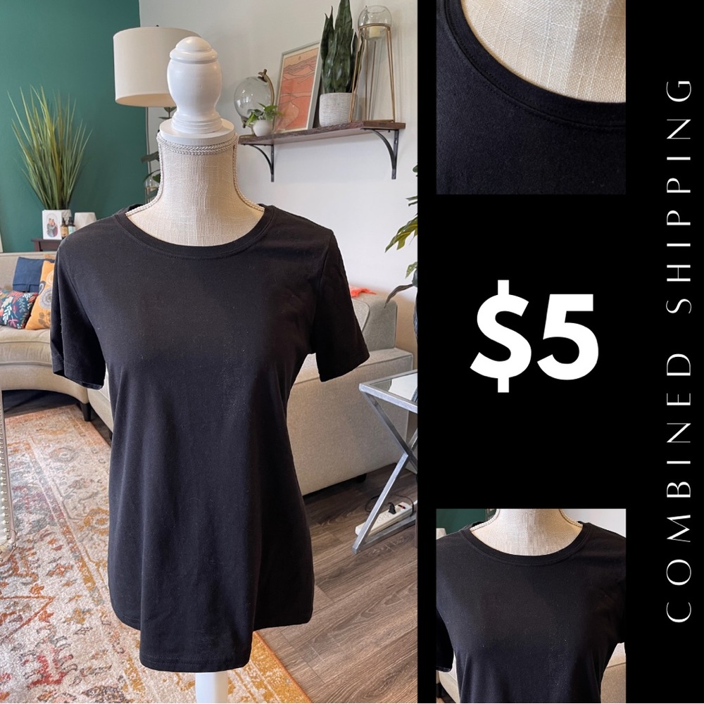 Flattering, standard cotton black t-shirt.